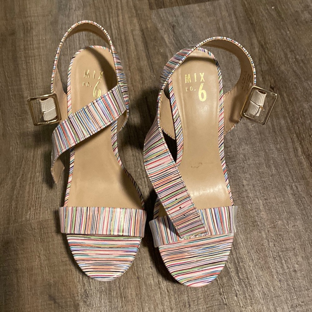 Multi colored high heeled wedges.